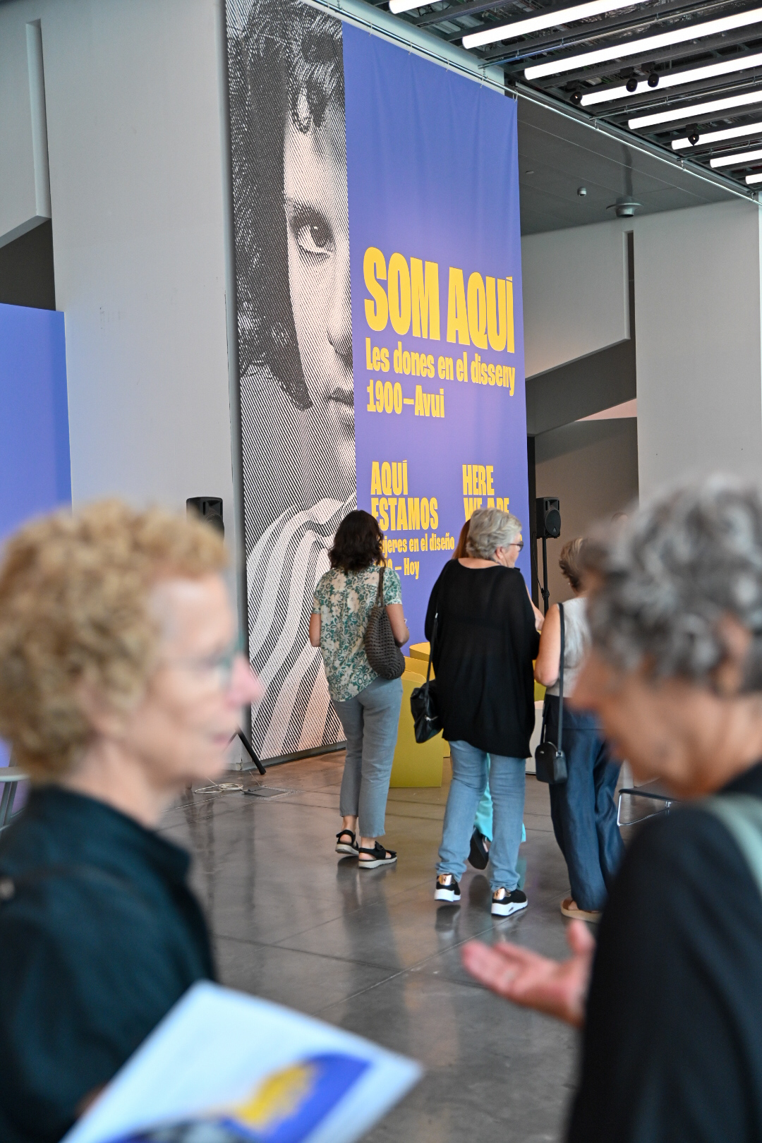 SOM AQUÍ! Les dones en el disseny. 1900 – Avui