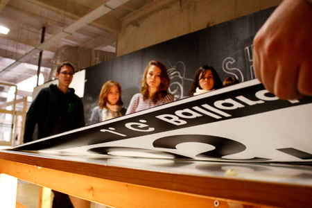 3rd Grade Design Students during the application of the vinyls at the AAAB space - Mactac