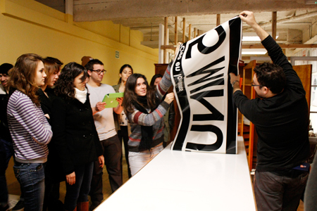 3rd Grade Design Students during the application of the vinyls at the AAAB space - Mactac